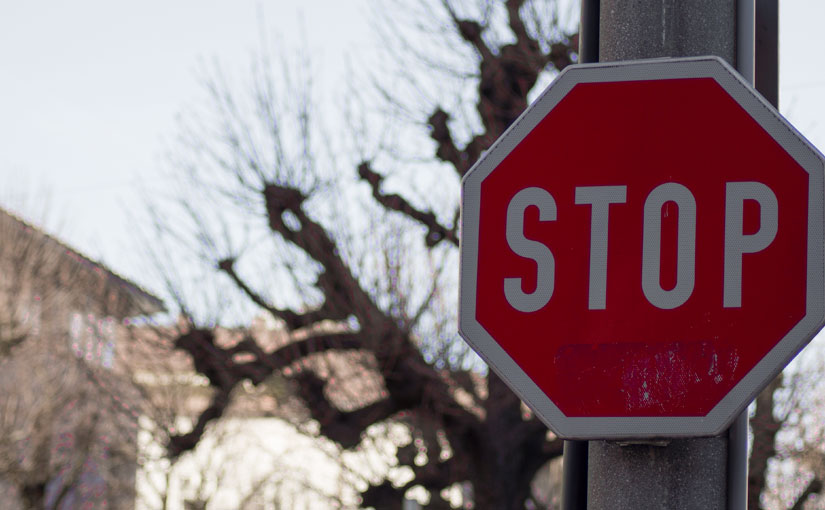 Stop sign from a crossroad in Salzburg City