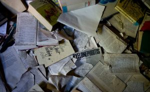 A lot of books in the old library of Stangass Asylum